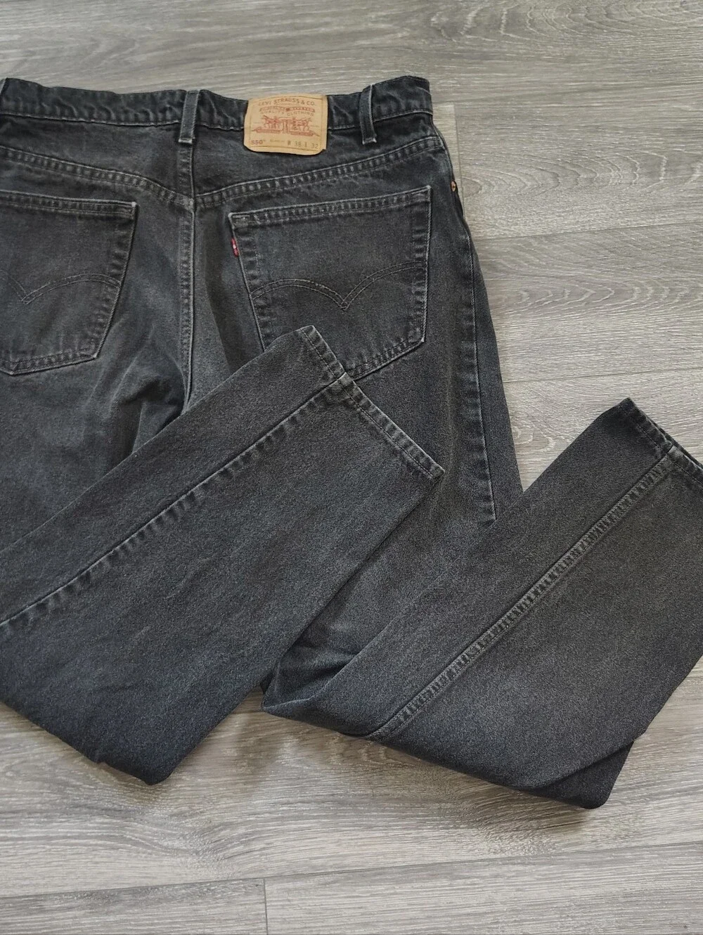 Vintage 90s Levi's 550 black denim jeans 38X32